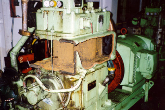 Fractured compressor water jacket casing after removal of coolers