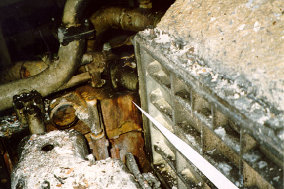 Exposed exhaust manifold adjacent No. 1 cylinder head