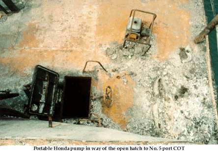 Portable Honda pump in way of open hatch to no 5. port cot