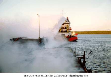 The CGS Sir Wilfred Grenfell fighting the fire