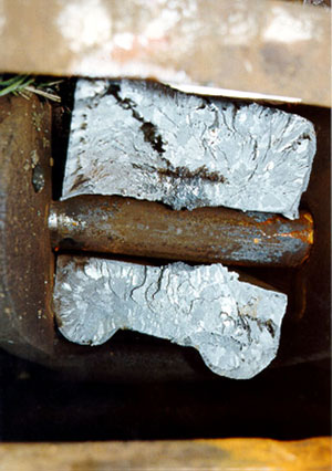 Figure 9 - Broken coupler shank on car GATX 9425 indicating significant longitudinal in-train forces during the derailment